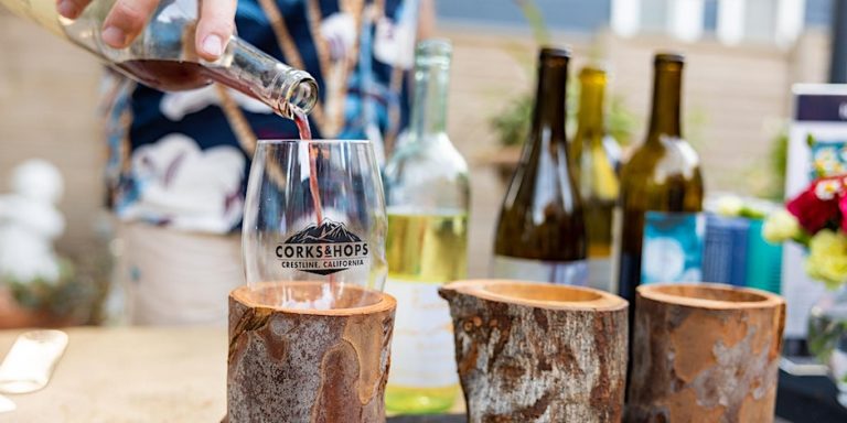 corks and hops pouring wine 2023 768x384